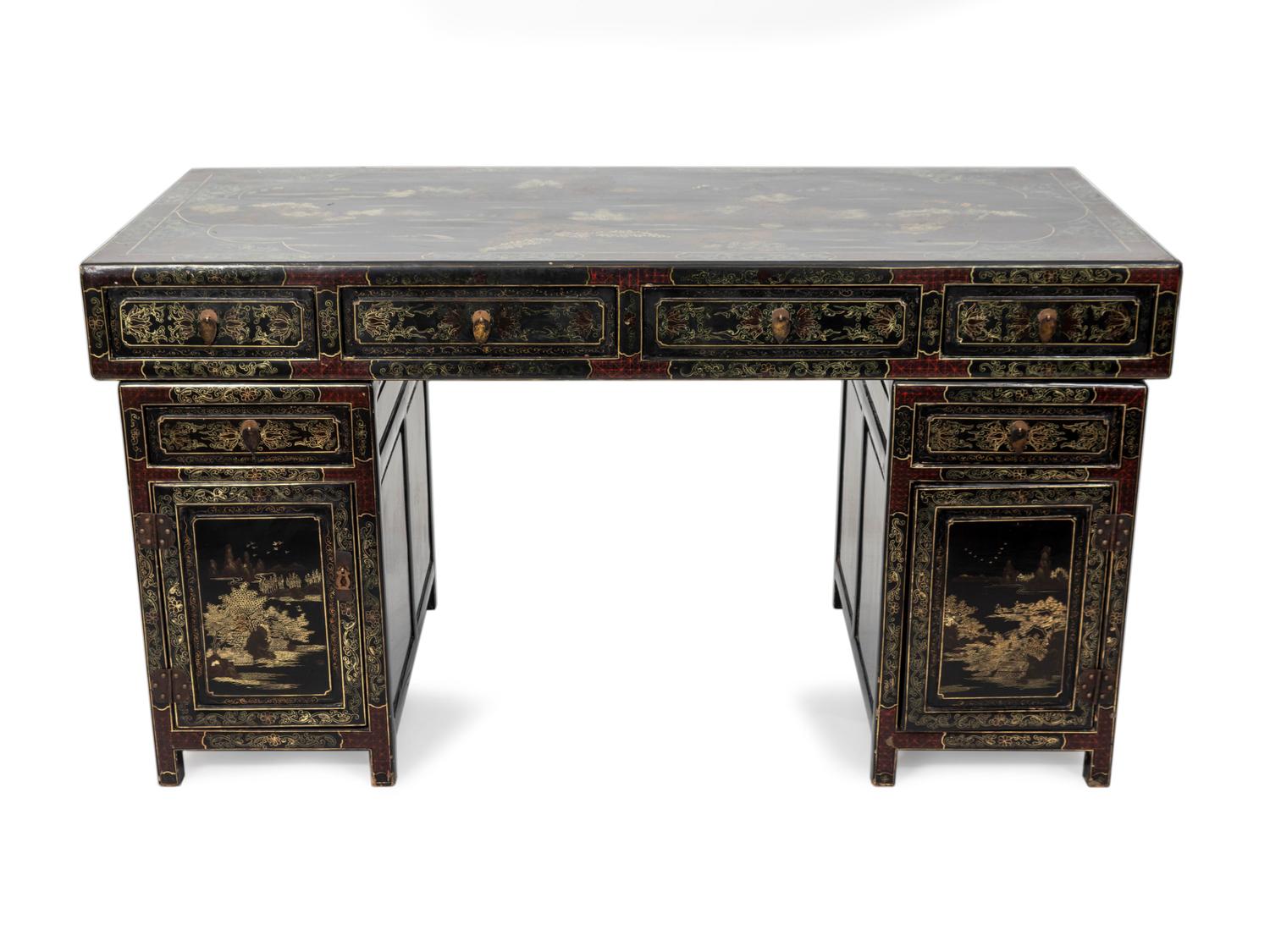A Chinese Black Lacquer and Parcel Gilt Decorated Pedestal Desk — EARLY 20TH CENTURY