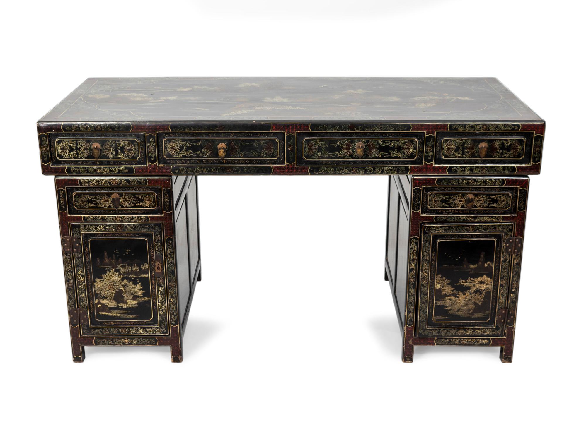 A Chinese Black Lacquer and Parcel Gilt Decorated Pedestal Desk — EARLY 20TH CENTURY
