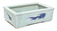 A Blue and White and Celadon Cachepot Length 9 1/2 inches.