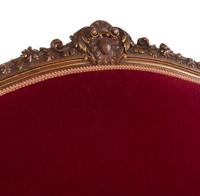 An Italian Louis XV Style Carved and Parcel Gilt Walnut Parlor Suite