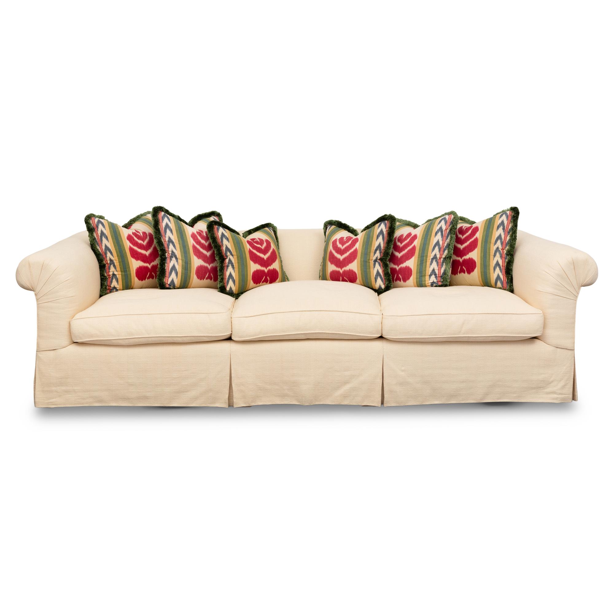 A Cream-Twill Upholstered Three-Cushion Sofa