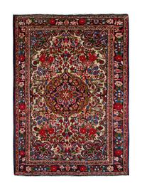 A Persian Wool Rug — 20TH CENTURY