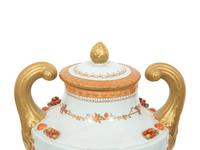 A Pair of Neoclassical Style Porcelain Urns with Bell Flower Swags