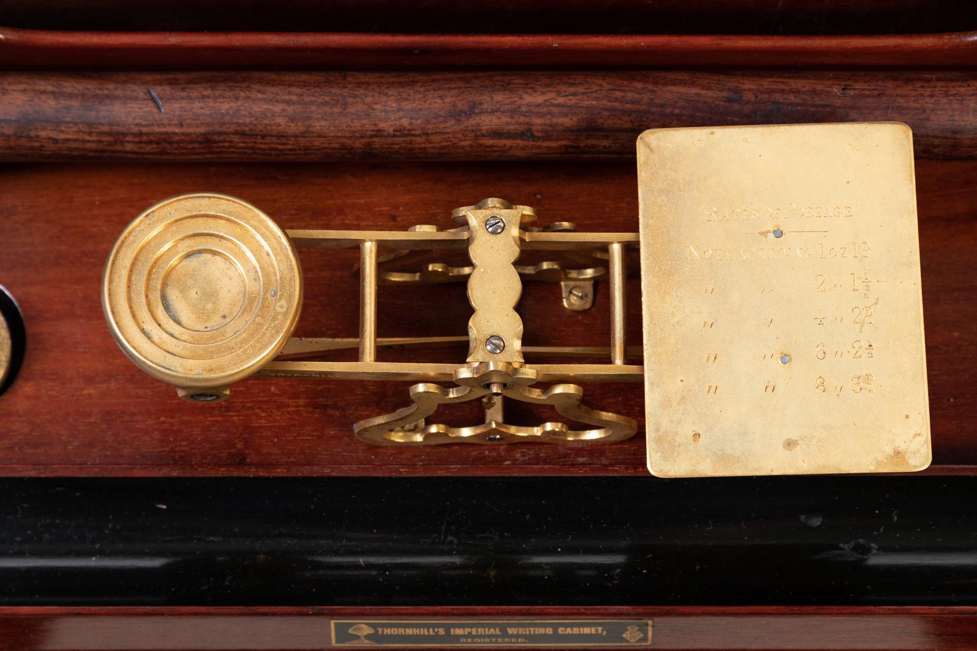 An English Brass-Mounted Mahogany Thornhill's Imperial Writing Cabinet