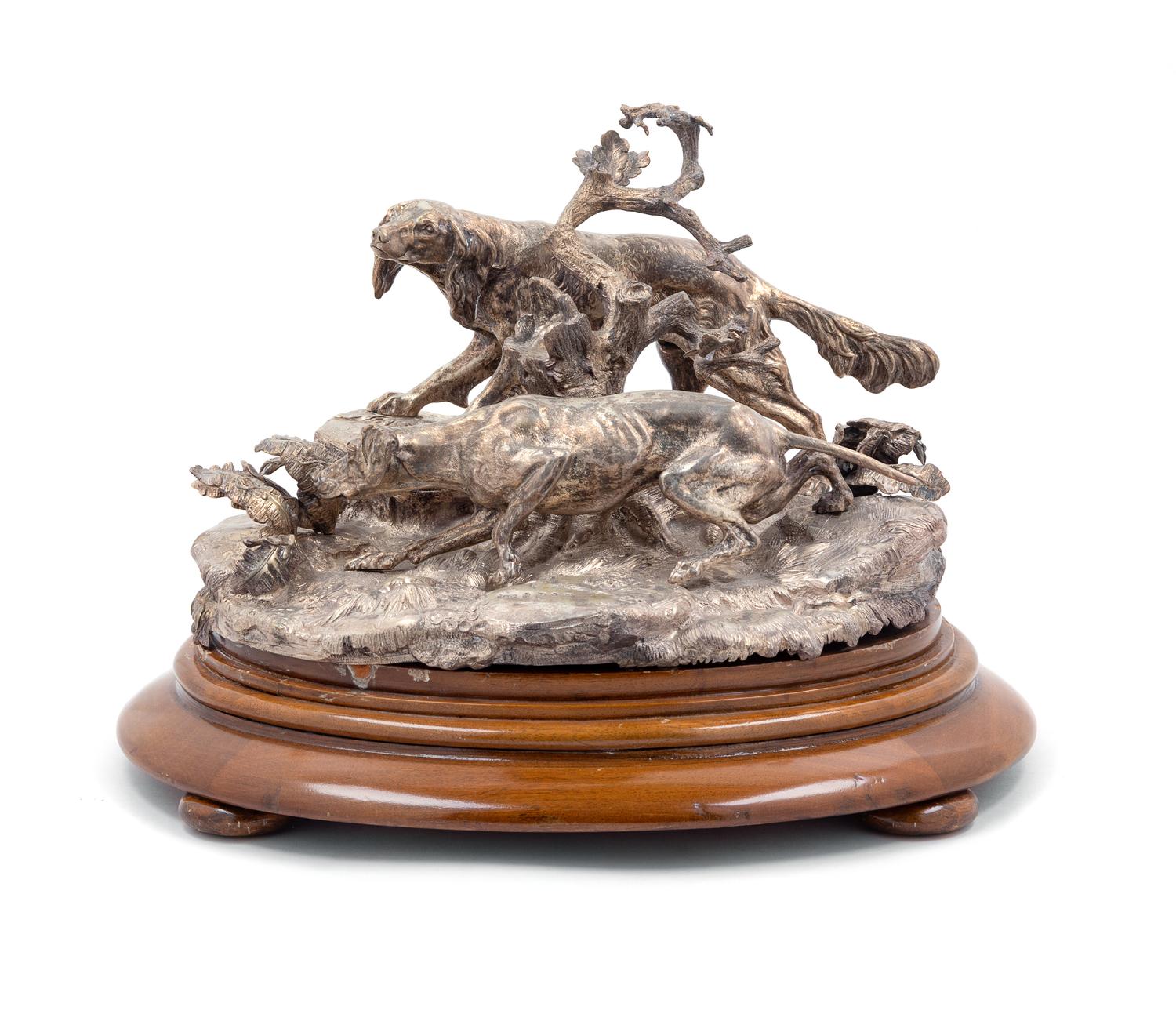 A Victorian Silver Figural Group, Elkington & Co., Ltd., Birmingham, 1861, modeled to show two scent hounds.