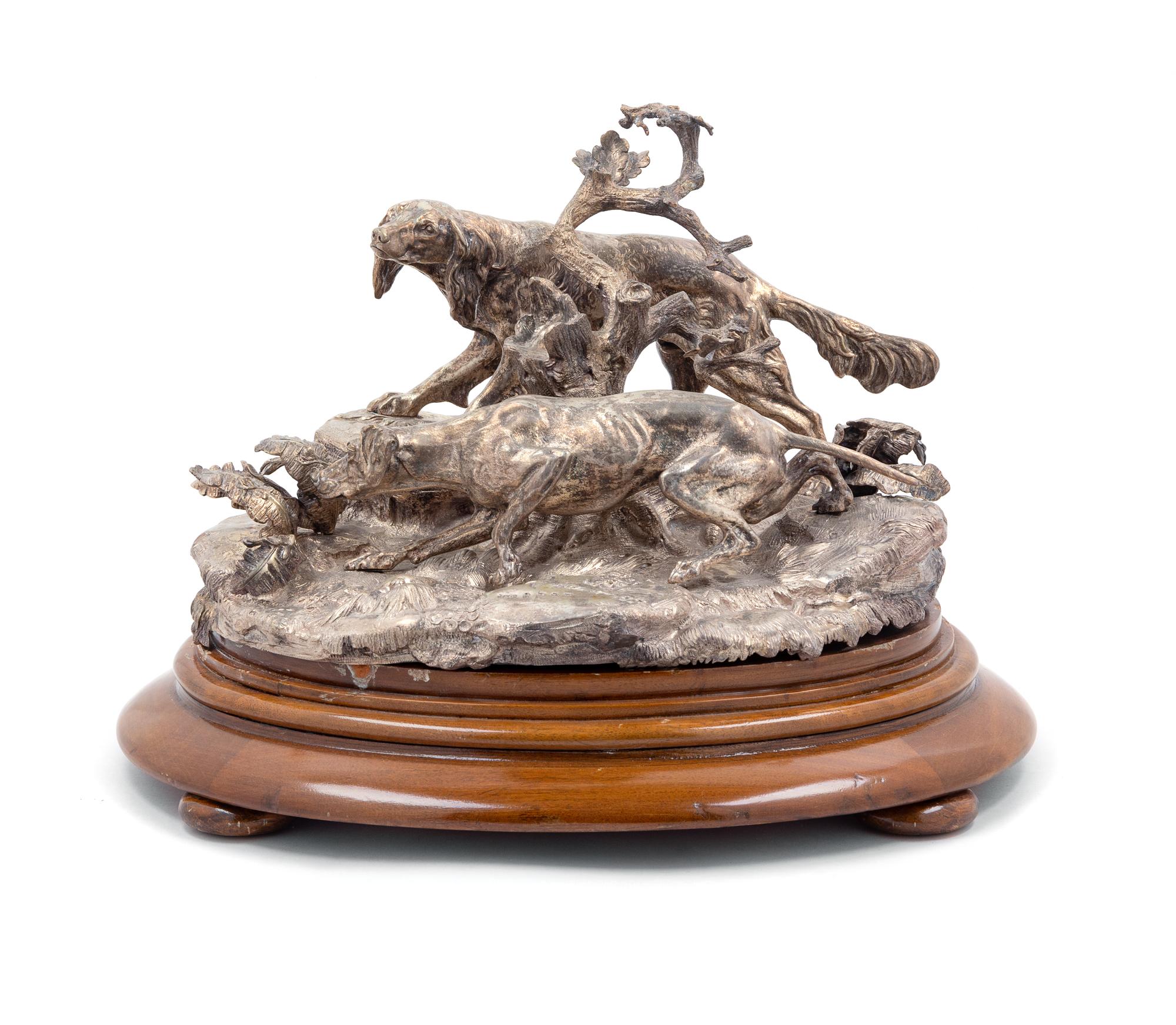 A Victorian Silver Figural Group, Elkington & Co., Ltd., Birmingham, 1861, modeled to show two scent hounds.