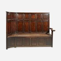 A George II/III Carved Oak Settle Possibly Welsh, 18th century