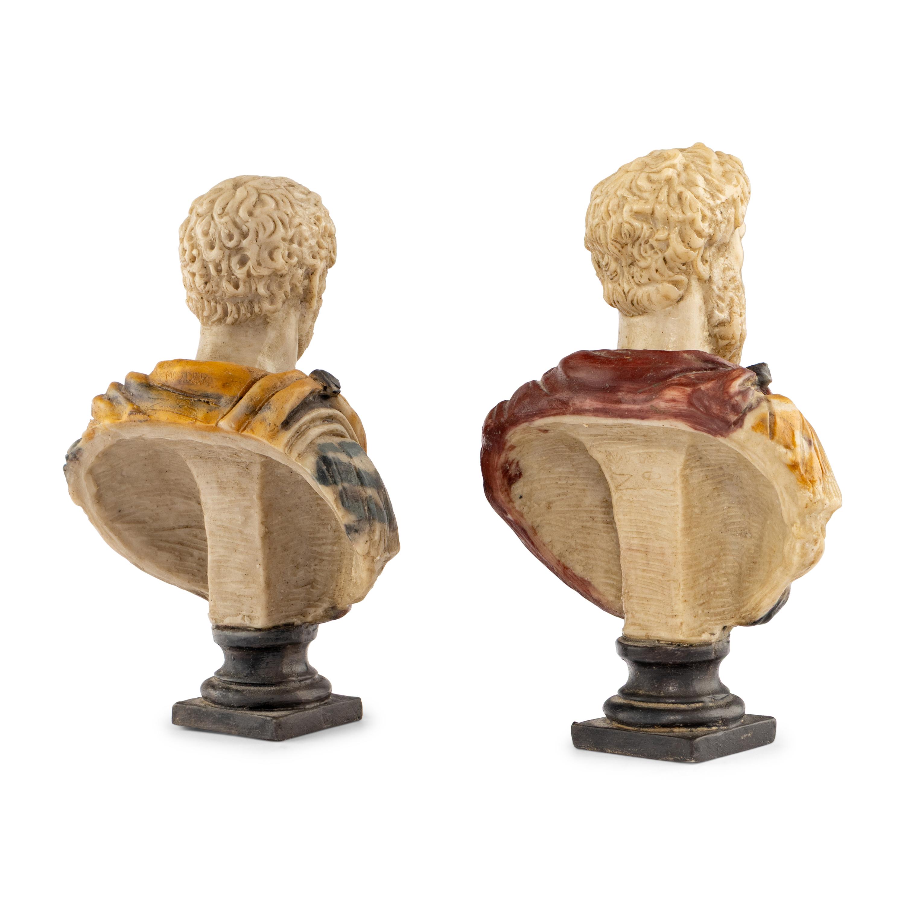A Pair of Composition Busts