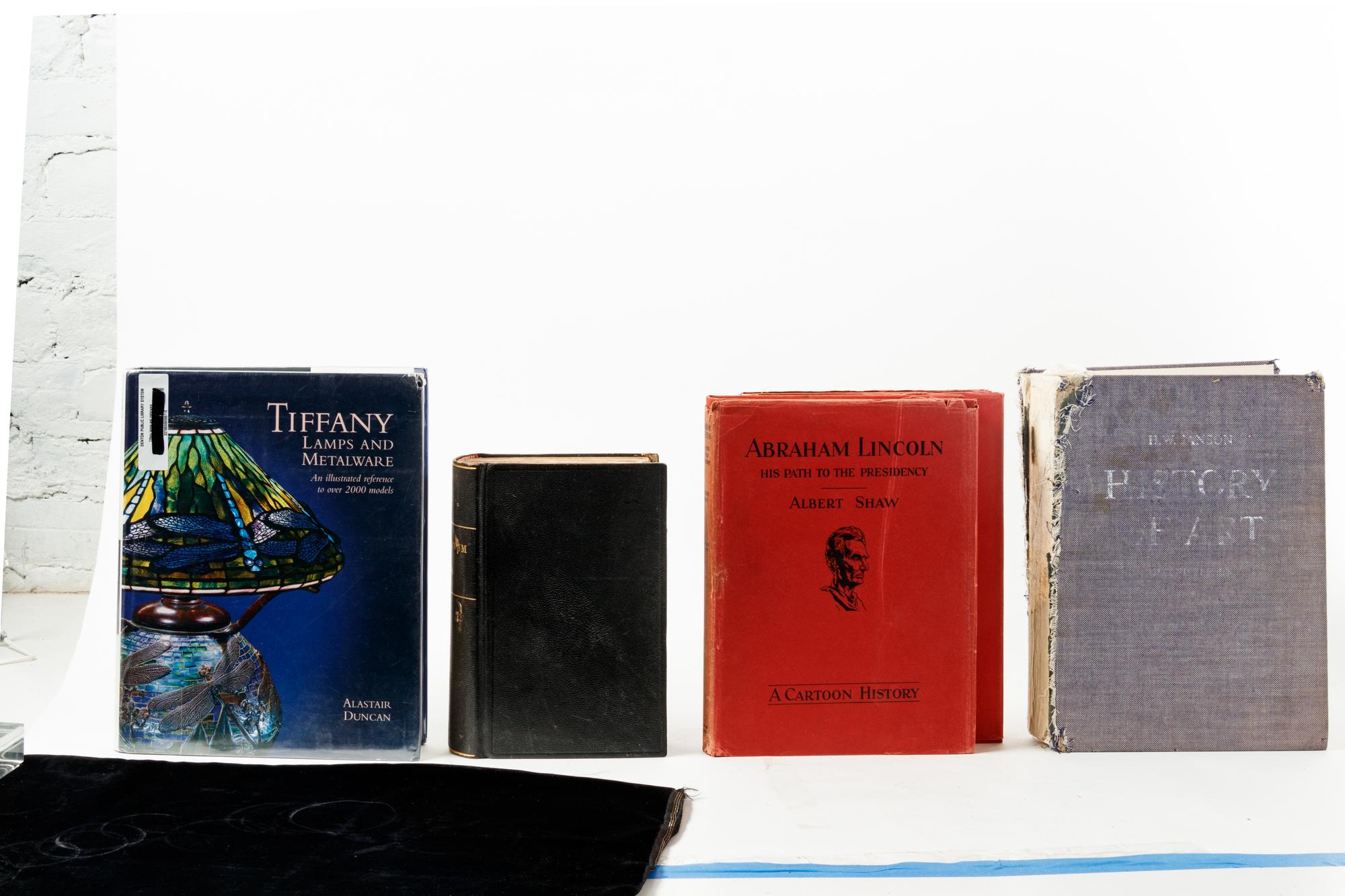A Group of Six Hardbound Books