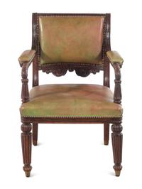 A Regency Simulated Rosewood Leather-Upholstered Library Chair in the Manner of Henry Holland