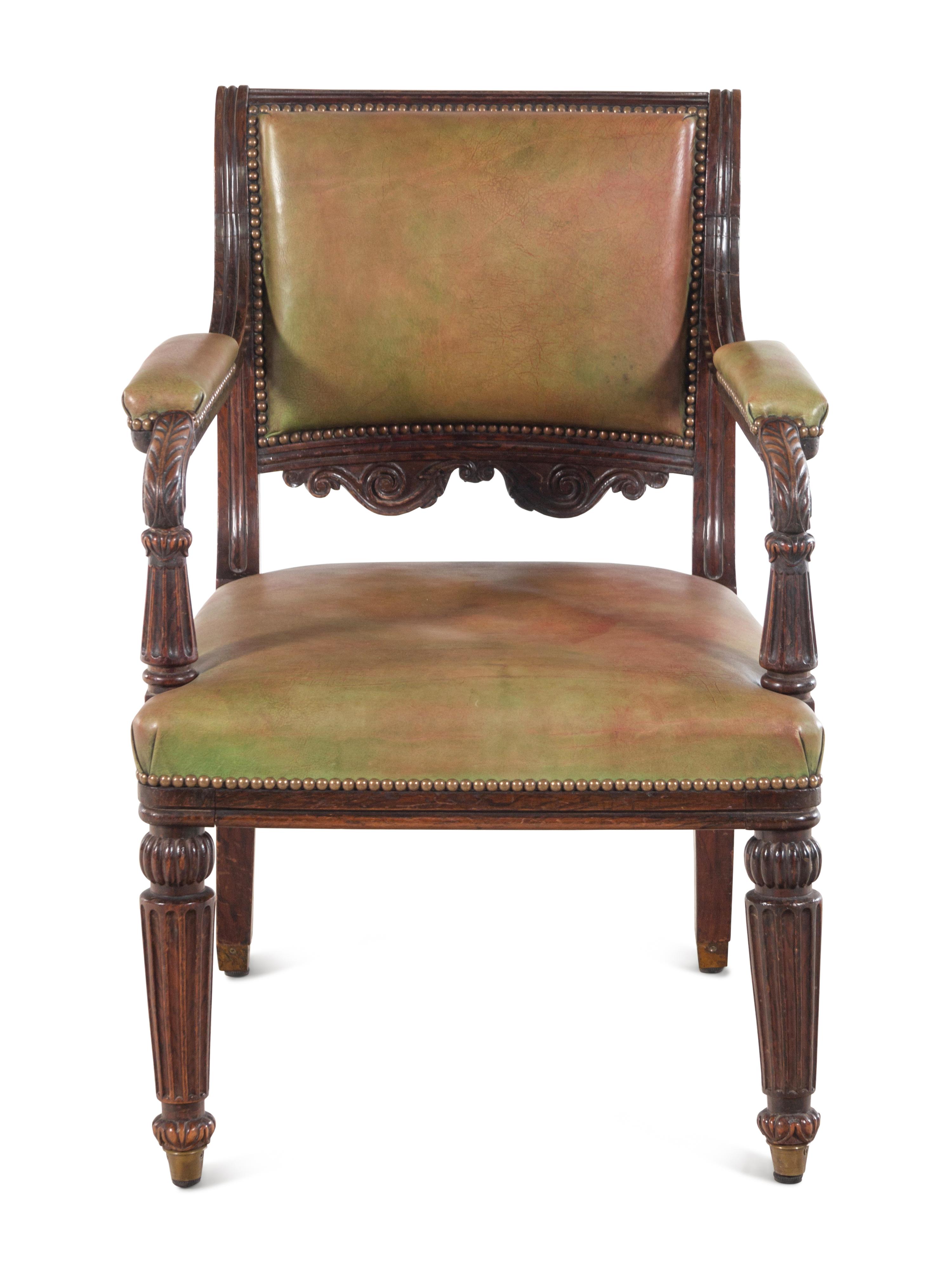 A Regency Simulated Rosewood Leather-Upholstered Library Chair in the Manner of Henry Holland