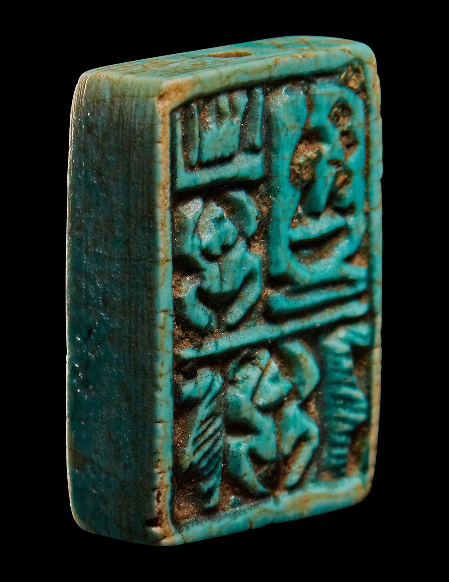 Two Egyptian Faience Seals and an Inscribed Bead