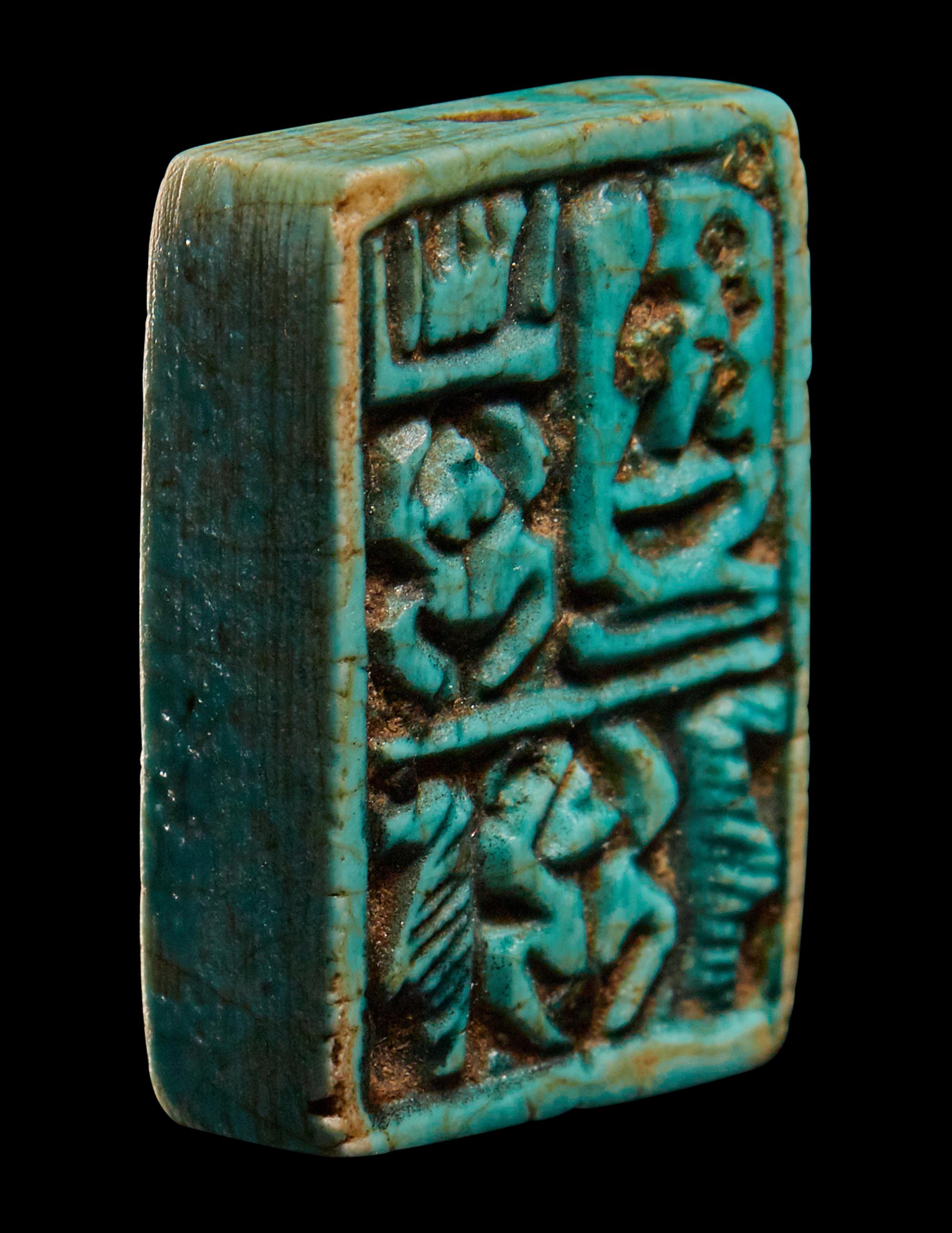 Two Egyptian Faience Seals and an Inscribed Bead
