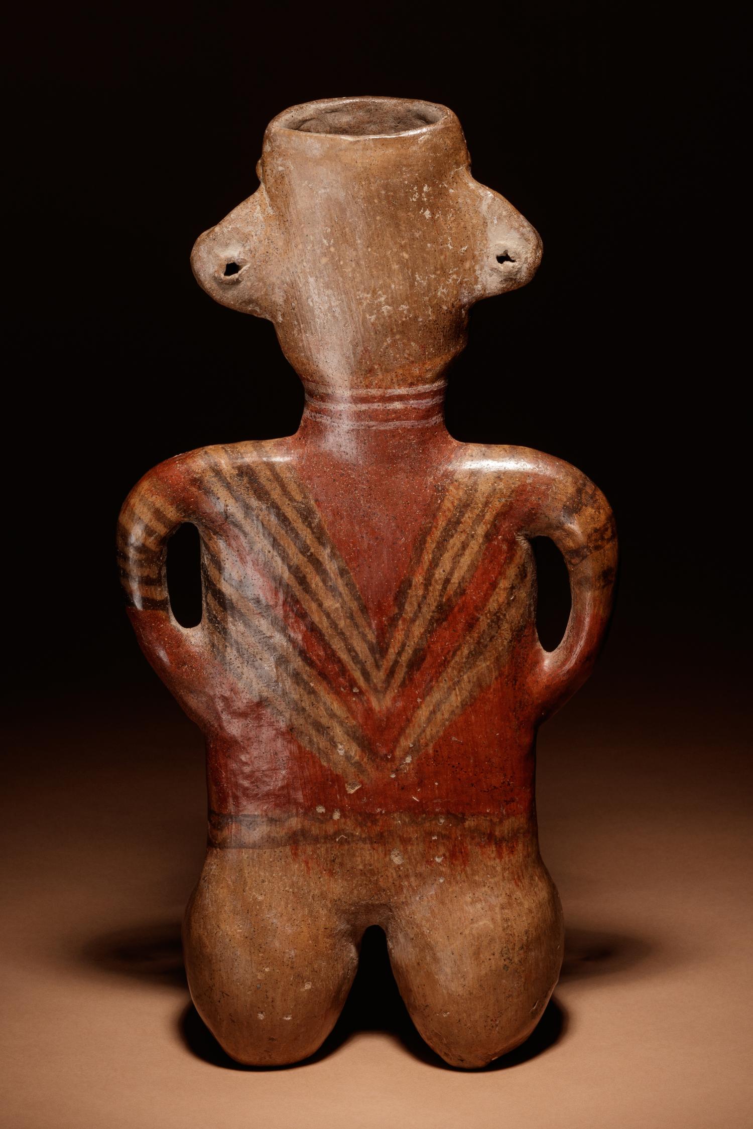 A Zacatecas Painted Terracotta Seated Female