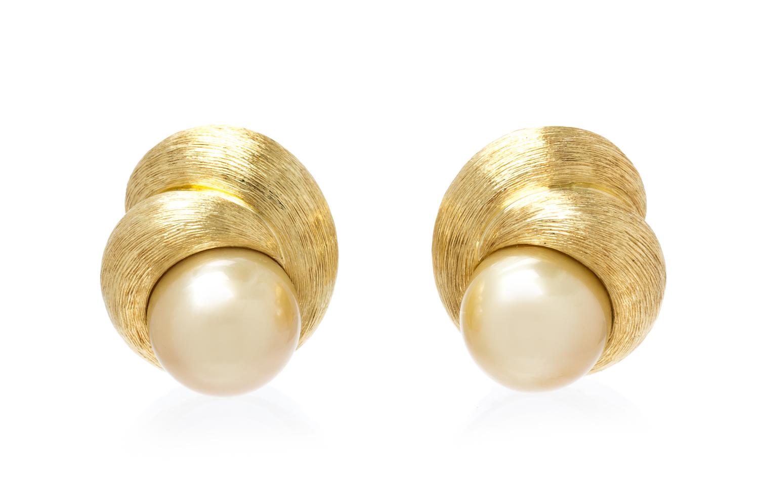 A Pair of 18 Karat Yellow Gold and Cultured Golden South Sea Pearl Earclips, Henry Dunay, 22.90 dwts.