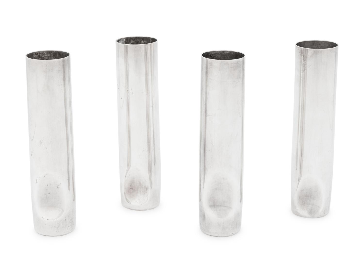 A Set of Four Elsa Peretti for Tiffany and Co. Italian Silver Thumbprint Bud Vases