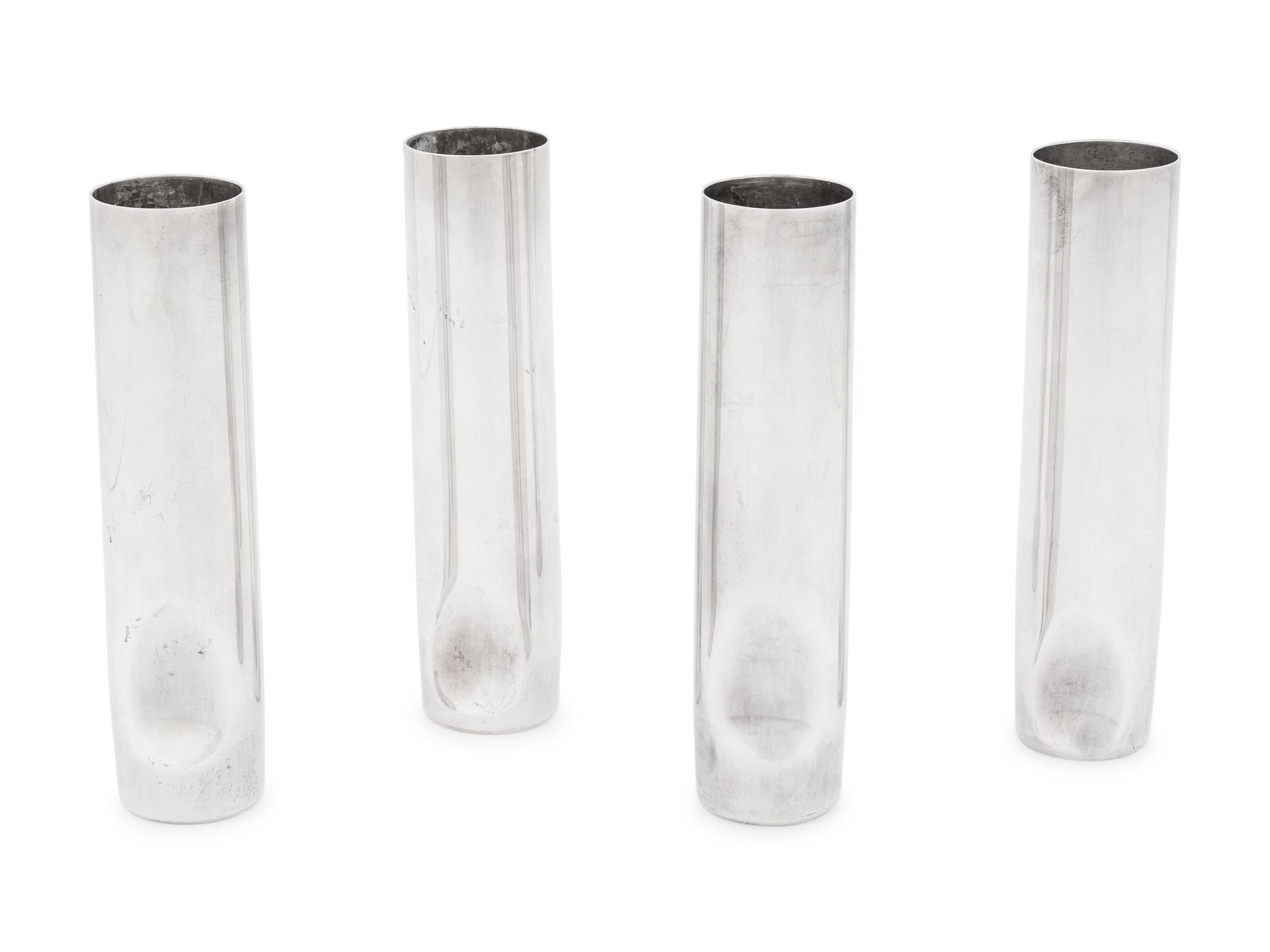 A Set of Four Elsa Peretti for Tiffany and Co. Italian Silver Thumbprint Bud Vases