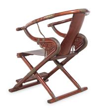 A Chinese Possibly Huanghuali Wood Folding Armchair, Jiaoyi