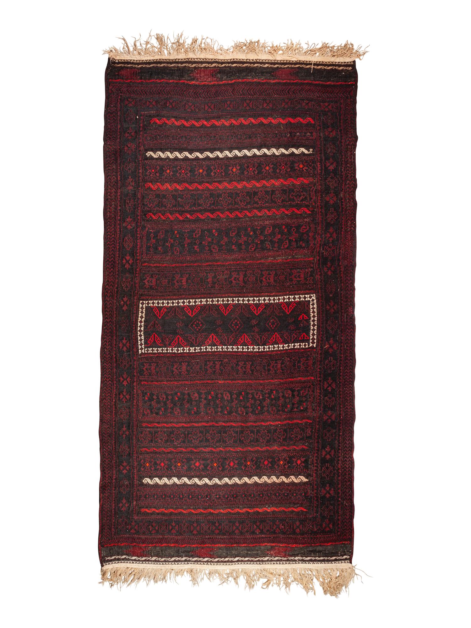 An Afghan Baluch Wool Rug