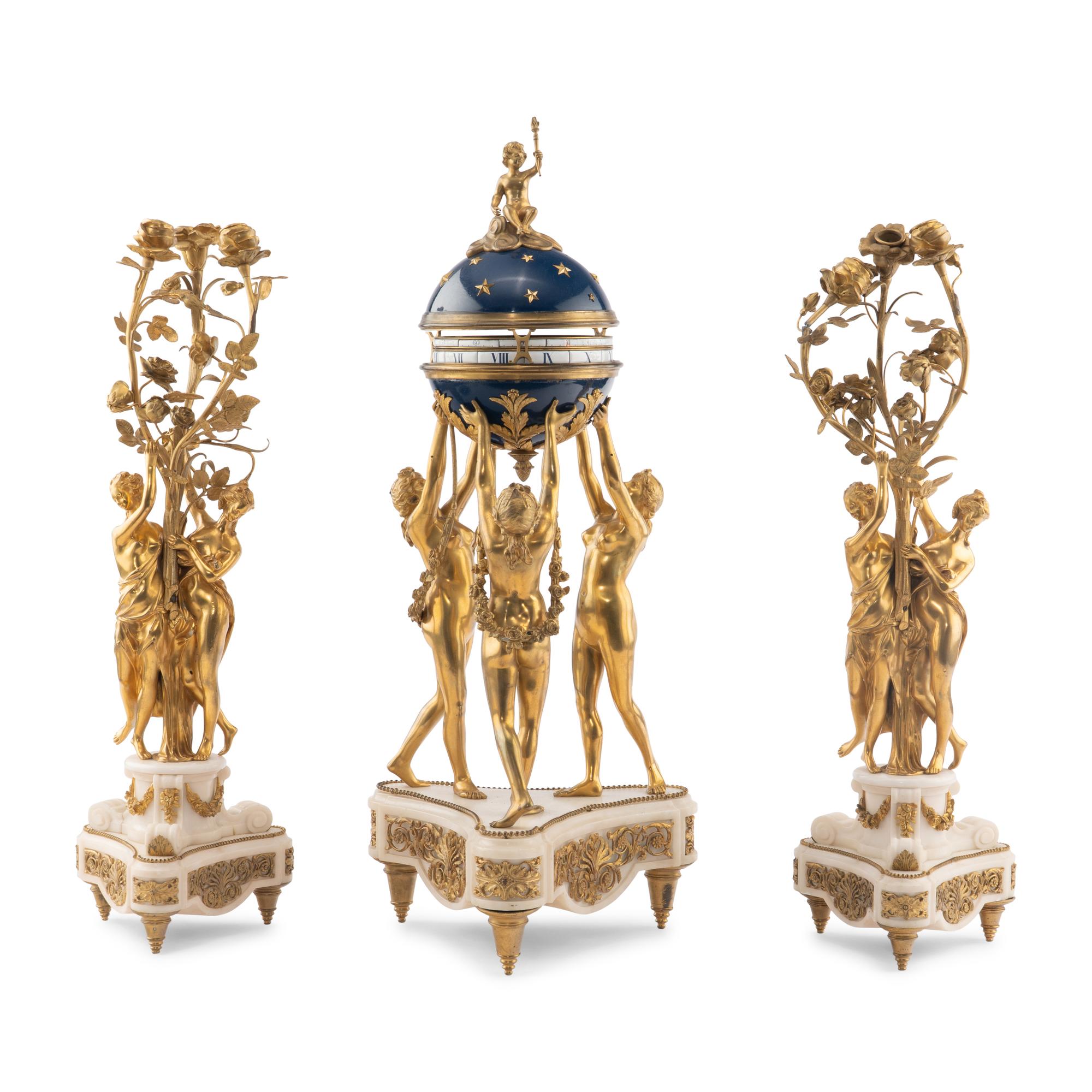 A Louis XVI Style Gilt-Bronze and White Marble Annular Clock Garniture
