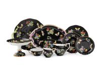A Herend Queen Victoria Black Porcelain Dinner Service