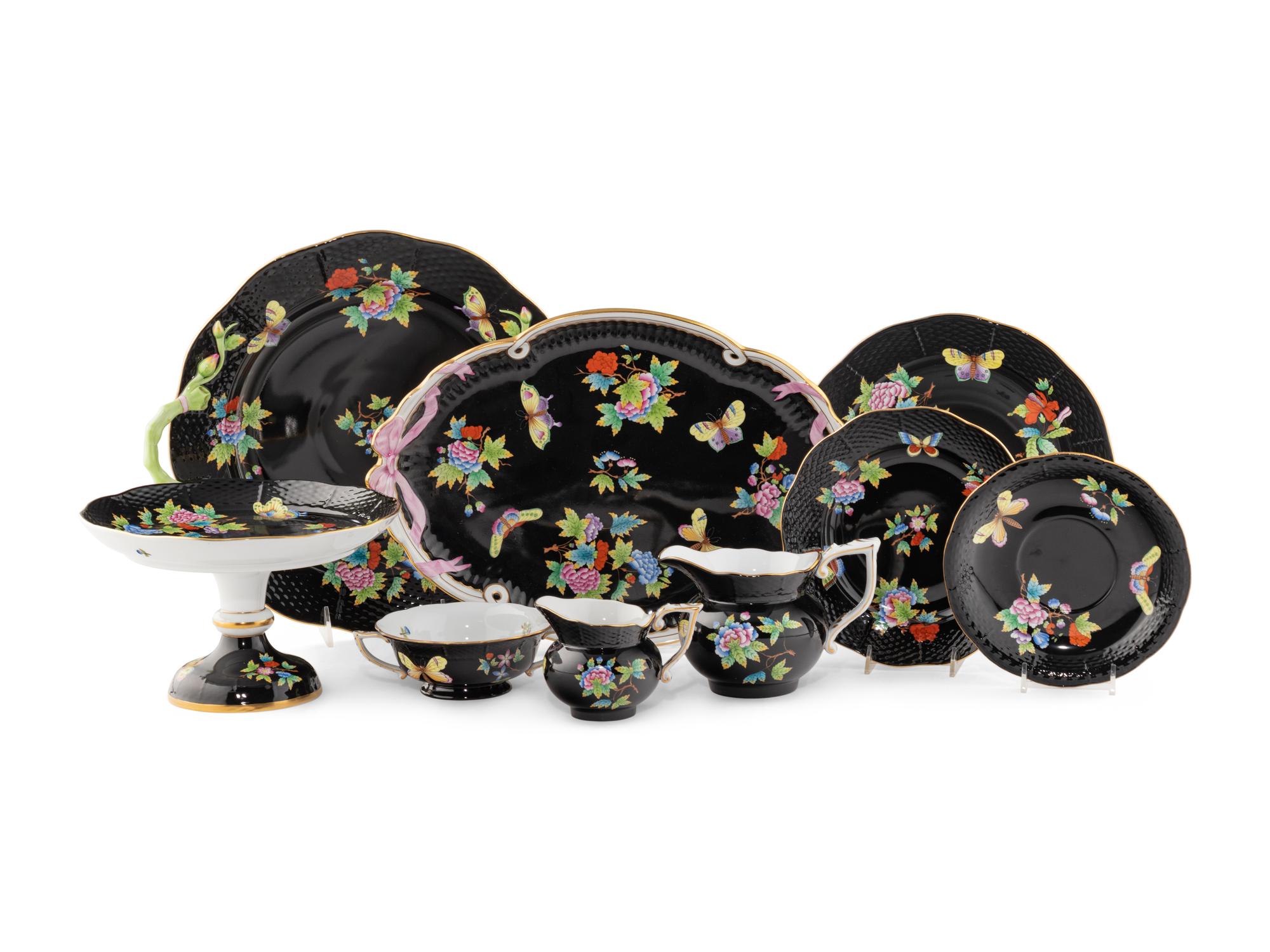 A Herend Queen Victoria Black Porcelain Dinner Service
