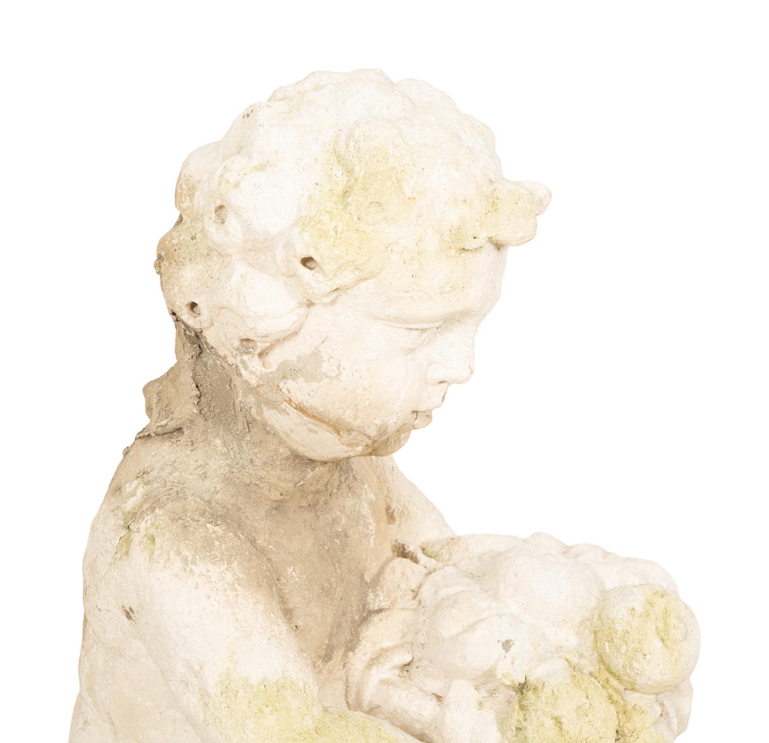 A Pair of Carved Stone Cherubs