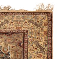 A Persian Wool and Silk Rug