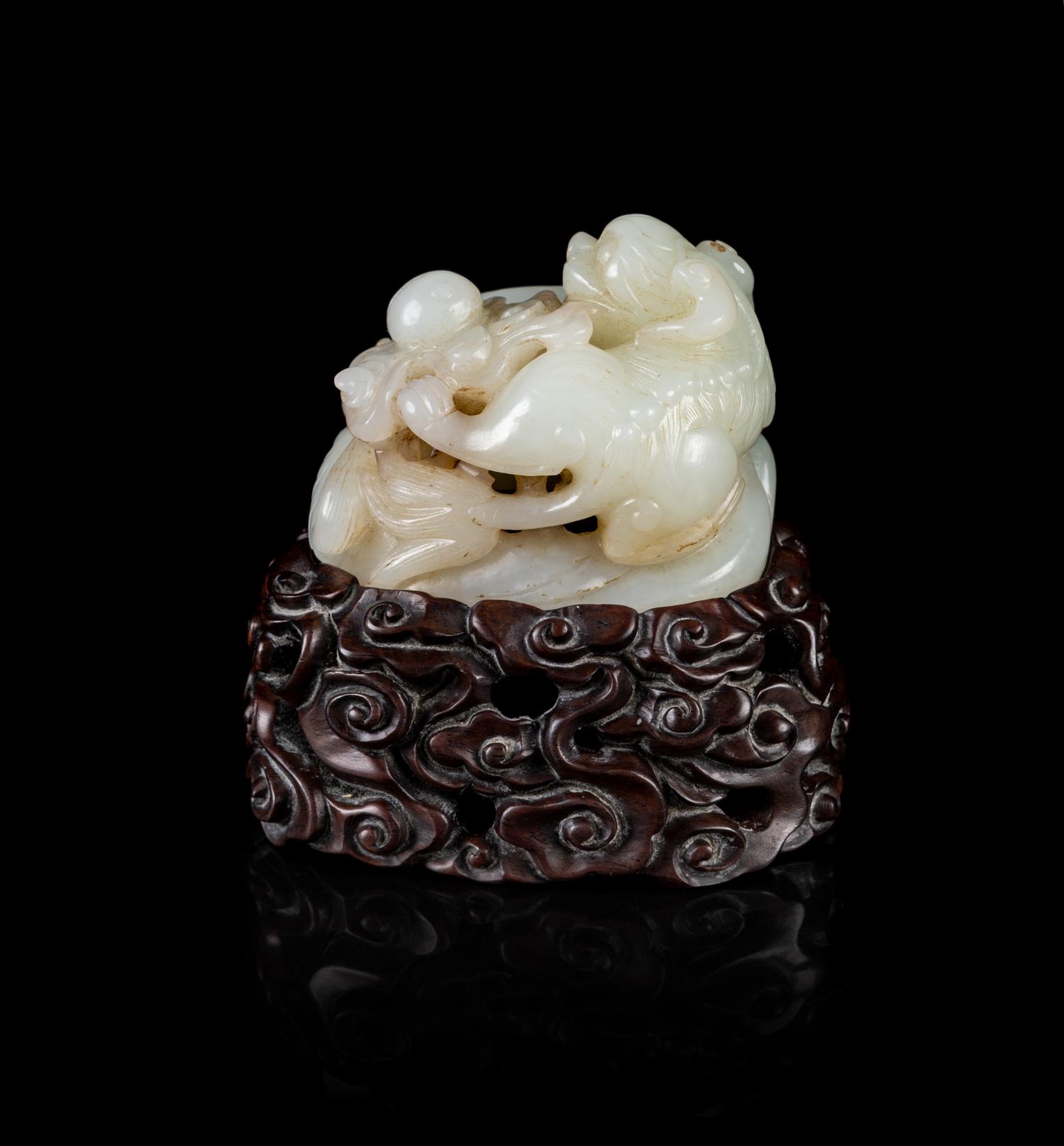 A Chinese Celadon Jade Figural Group of Tianlu