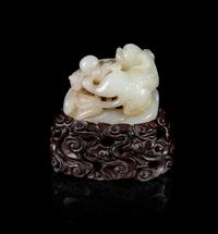A Chinese Celadon Jade Figural Group of Tianlu