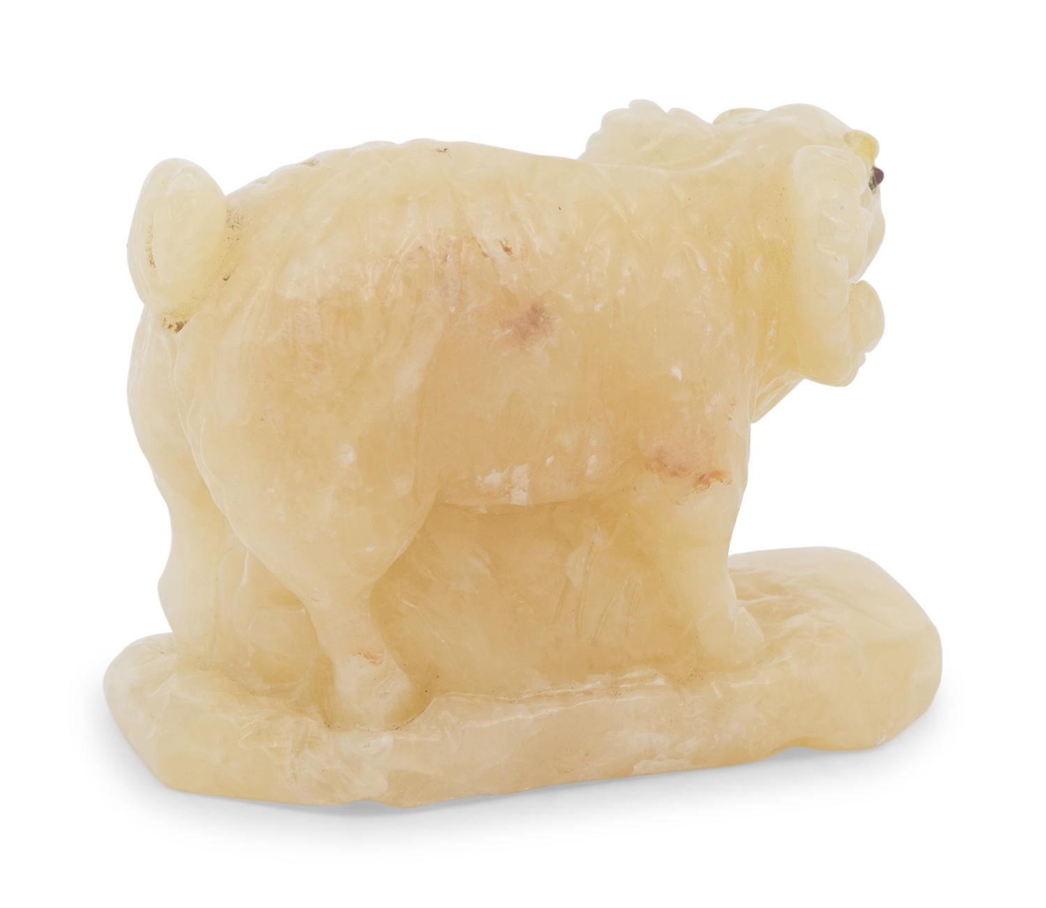 A Ruby-Inset Carved Hardstone Ram Figure