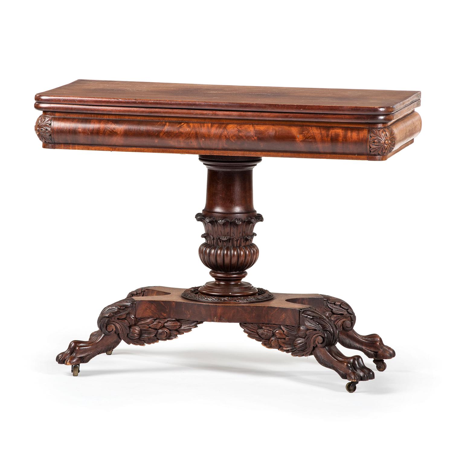 A Classical Carved Mahogany Claw-Foot Game Table