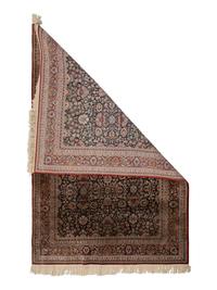 A Silk Tabriz Rug