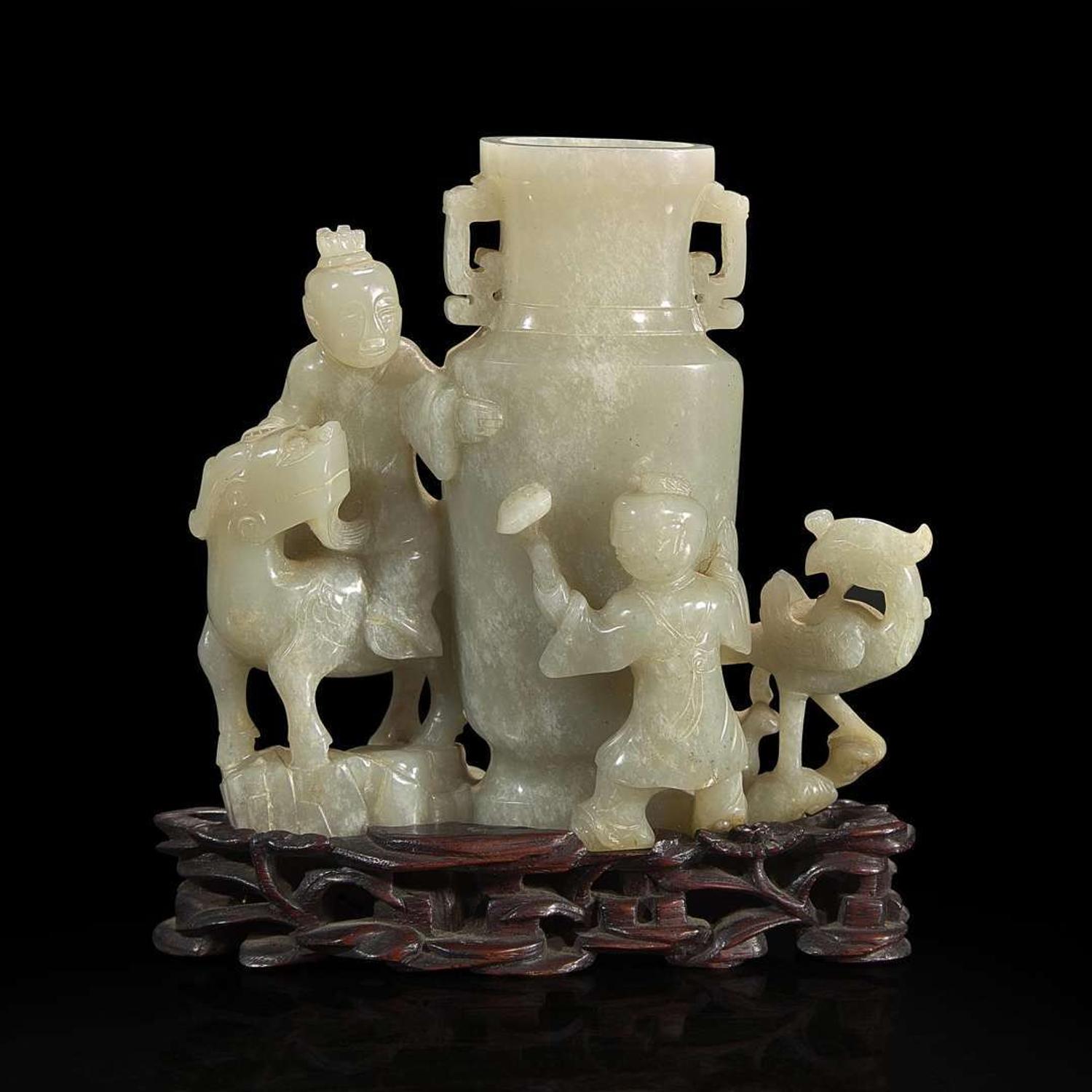 A Chinese jade "Boys, Kylin and Phoenix" vase on carved wood stand 玉雕童子凤鸟花樽及底座