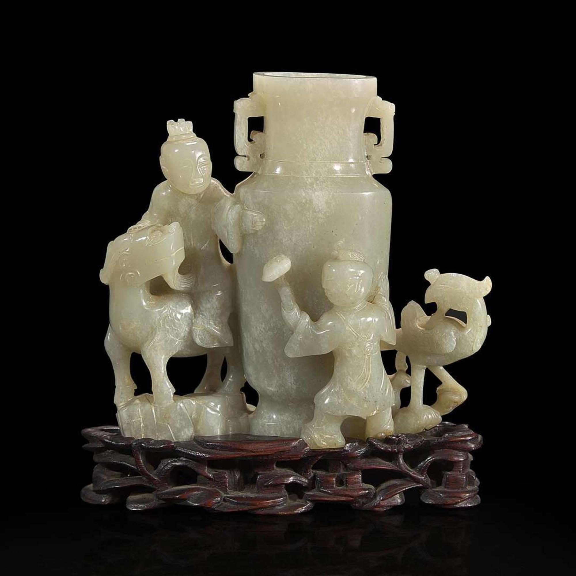 A Chinese jade "Boys, Kylin and Phoenix" vase on carved wood stand 玉雕童子凤鸟花樽及底座