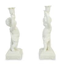 A Pair of Italian Creamware Figural Candelabra