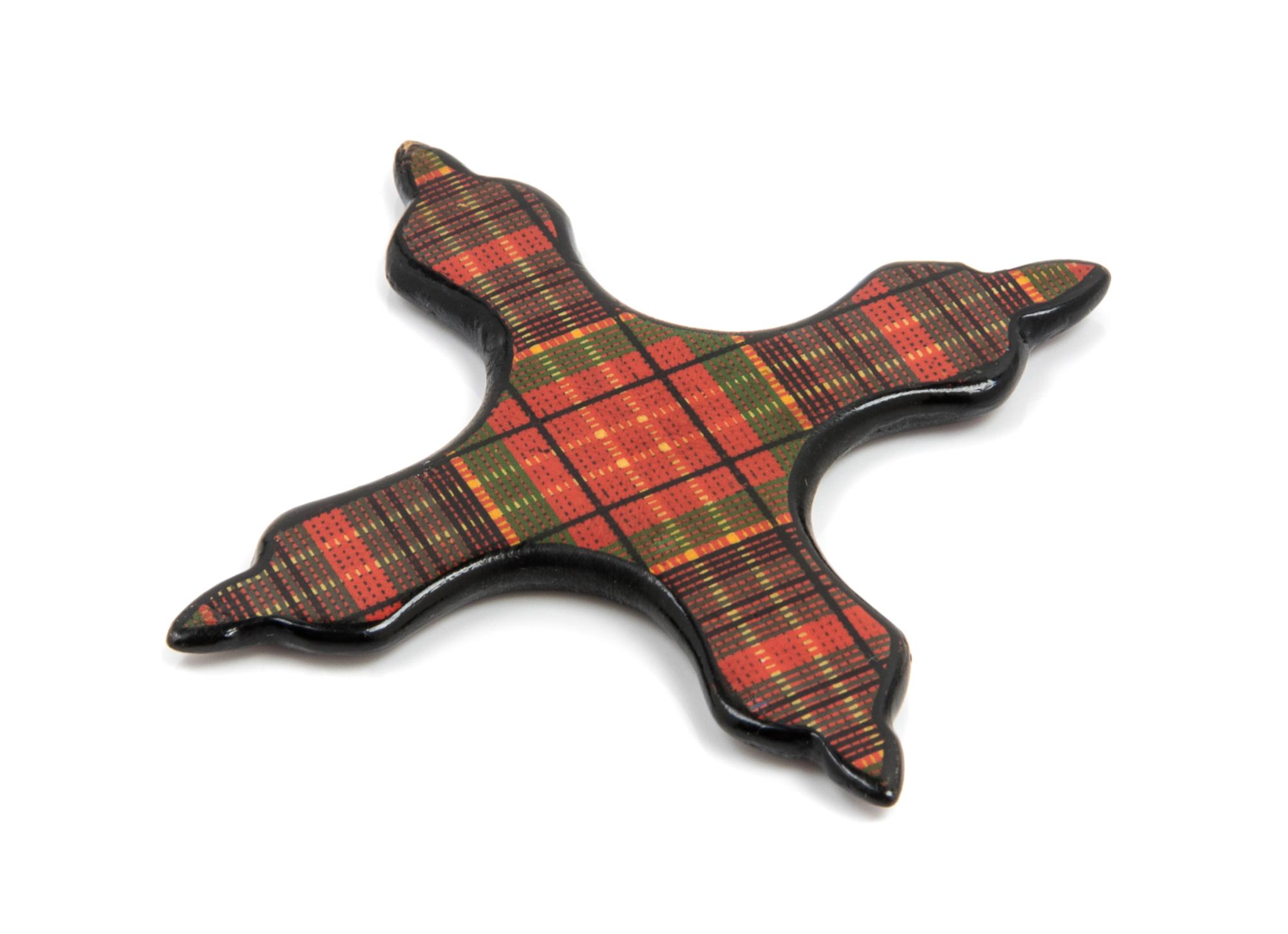 A Tartanware Four Point Thread Winder Width 2 1/4 inches.