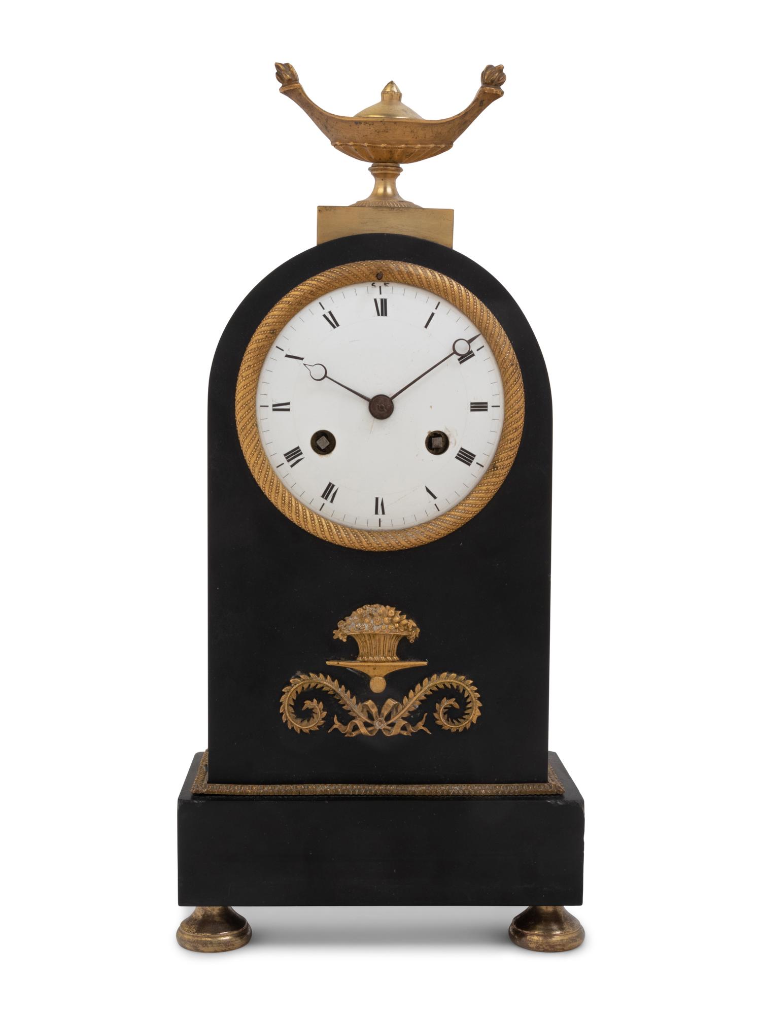 A Directoire Gilt and Patinated Bronze Mantel Clock