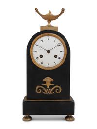 A Directoire Gilt and Patinated Bronze Mantel Clock