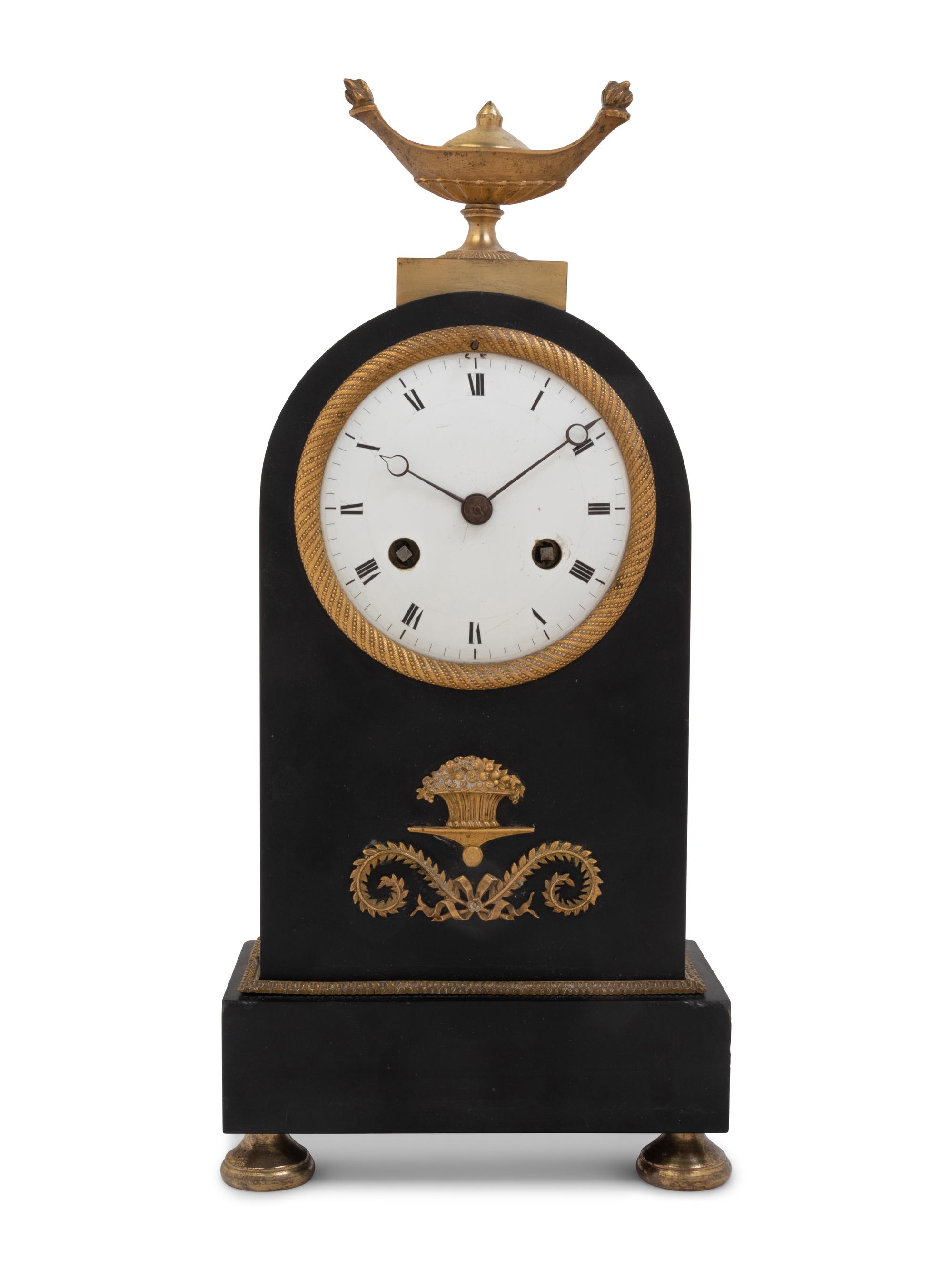 A Directoire Gilt and Patinated Bronze Mantel Clock