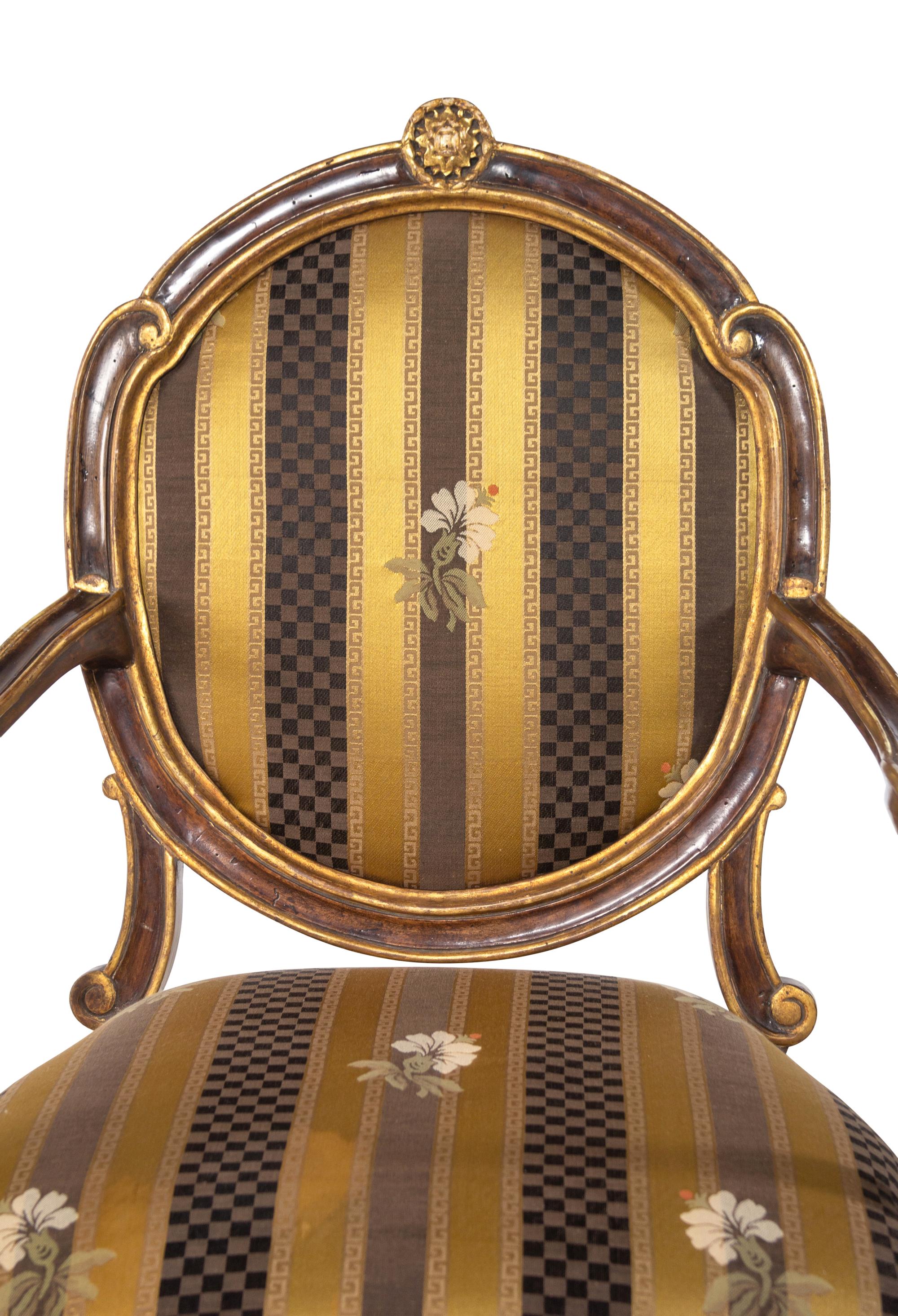 A Pair of Italian Painted and Parcel Gilt Armchairs