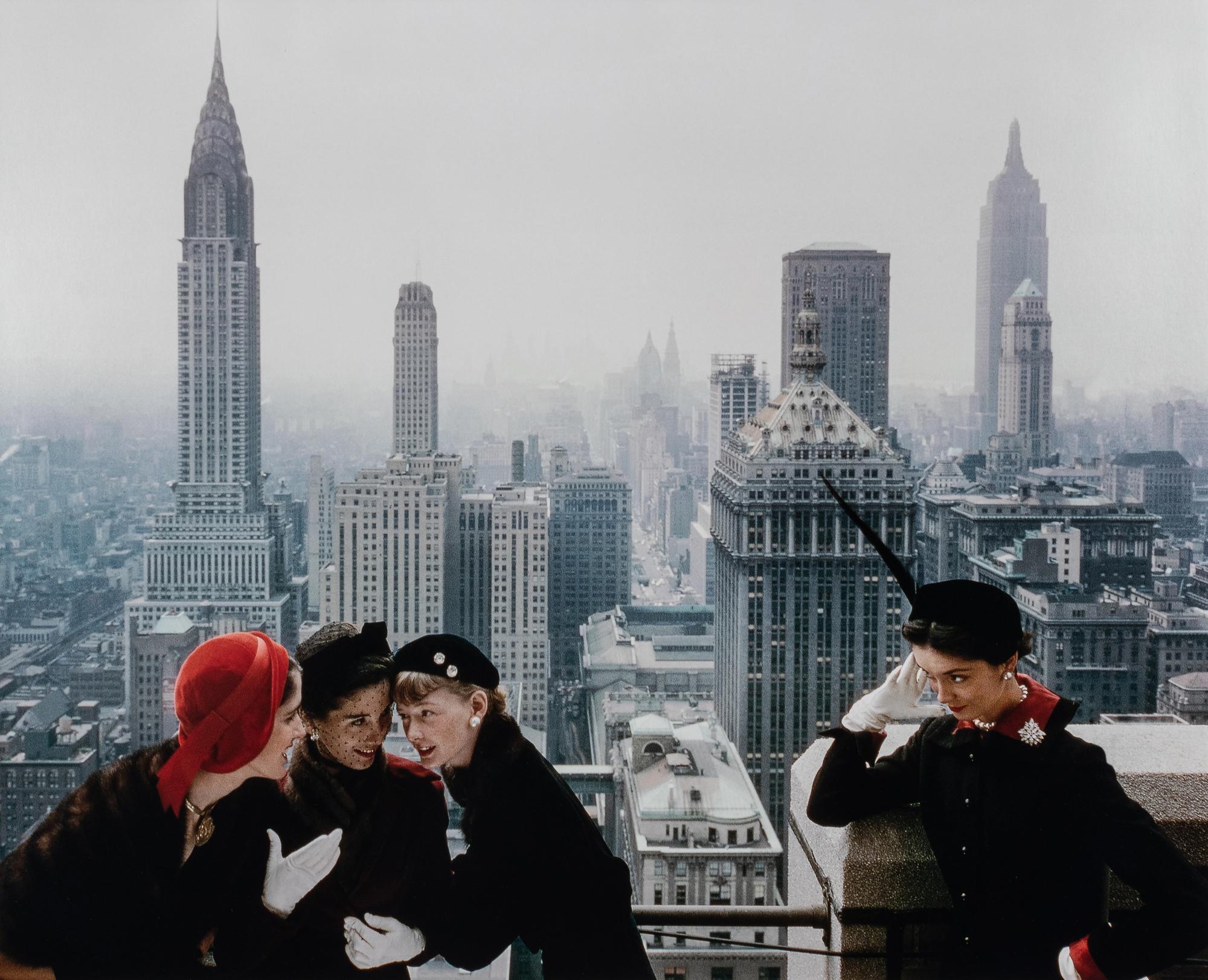 Norman Parkinson (1913-1990) Young Velvets, Young Prices, Hat Fashions, for British "Vogue" (The New York skyline from the roof of the Condé Nast building on Lexington Avenue, New York City), 1949