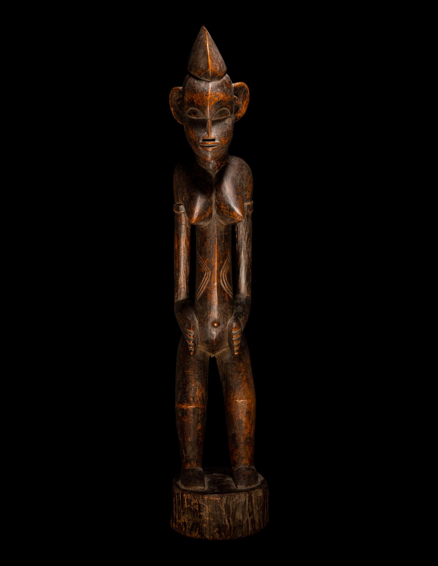 A Baule Wood Standing Female Figure