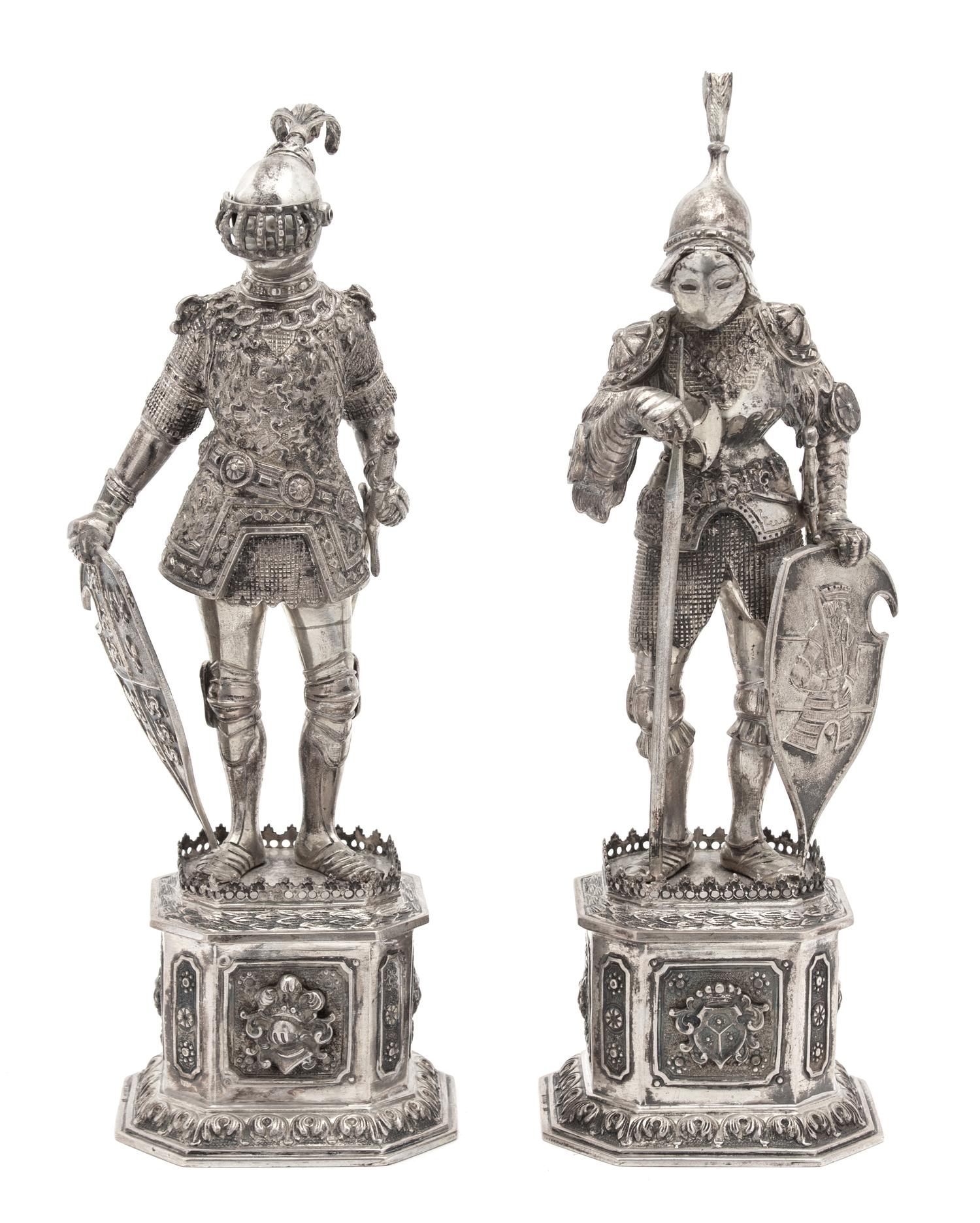 A Pair of German Hanau Silver Knights, 19TH CENTURY, depicting knights in full armor standing on pedestal bases.