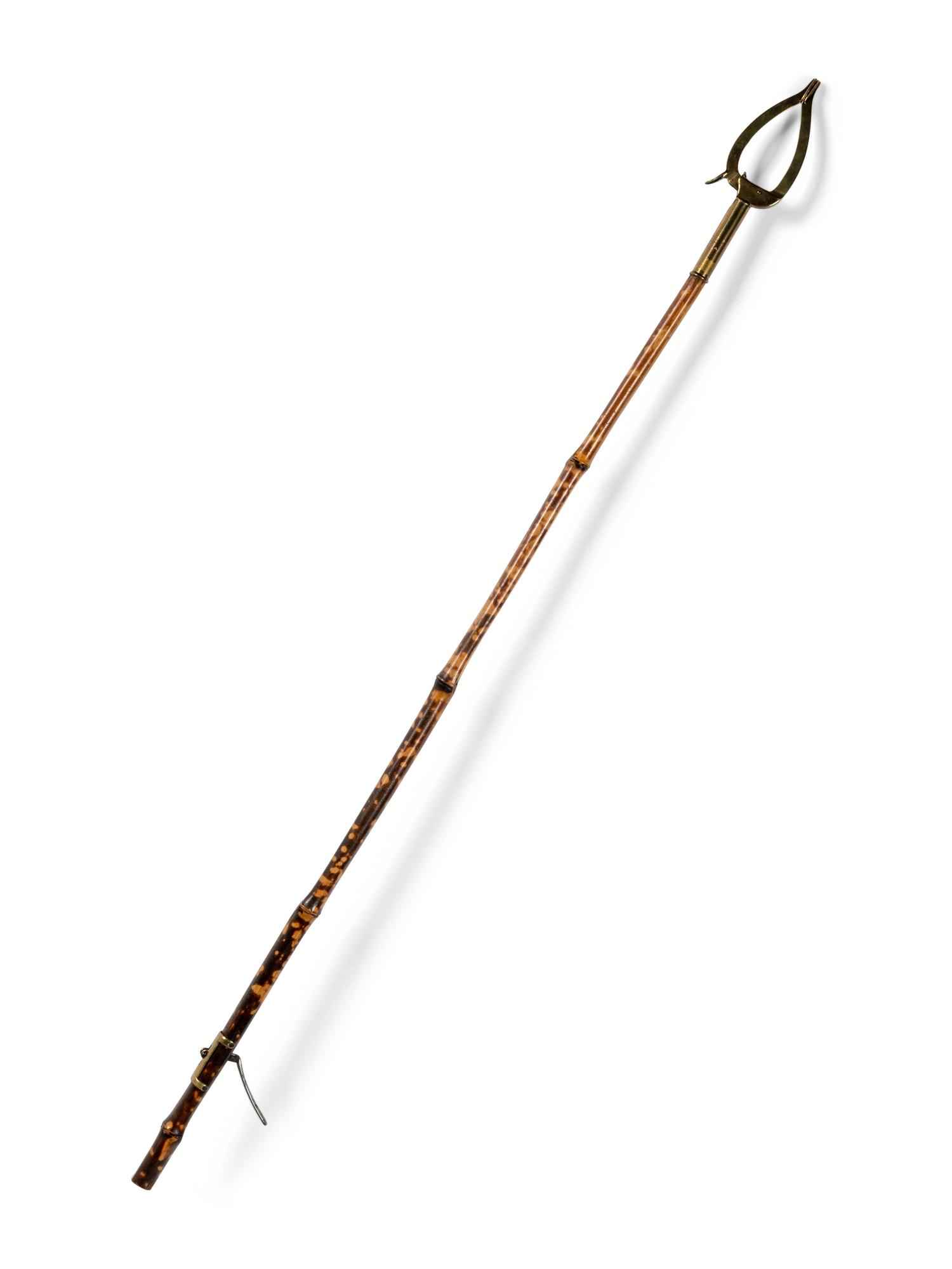 A Victorian Brass Mounted Bamboo Reaching Clamp