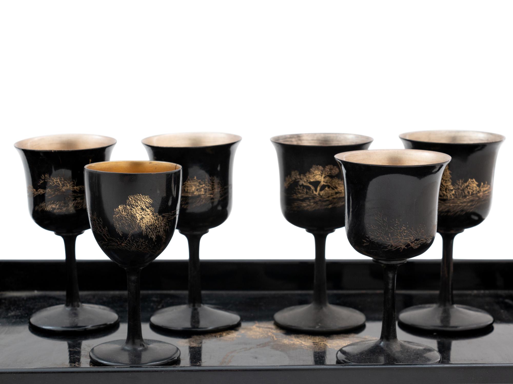 Fifteen Chinese Black and Gilt Lacquer 'Landscape' Articles