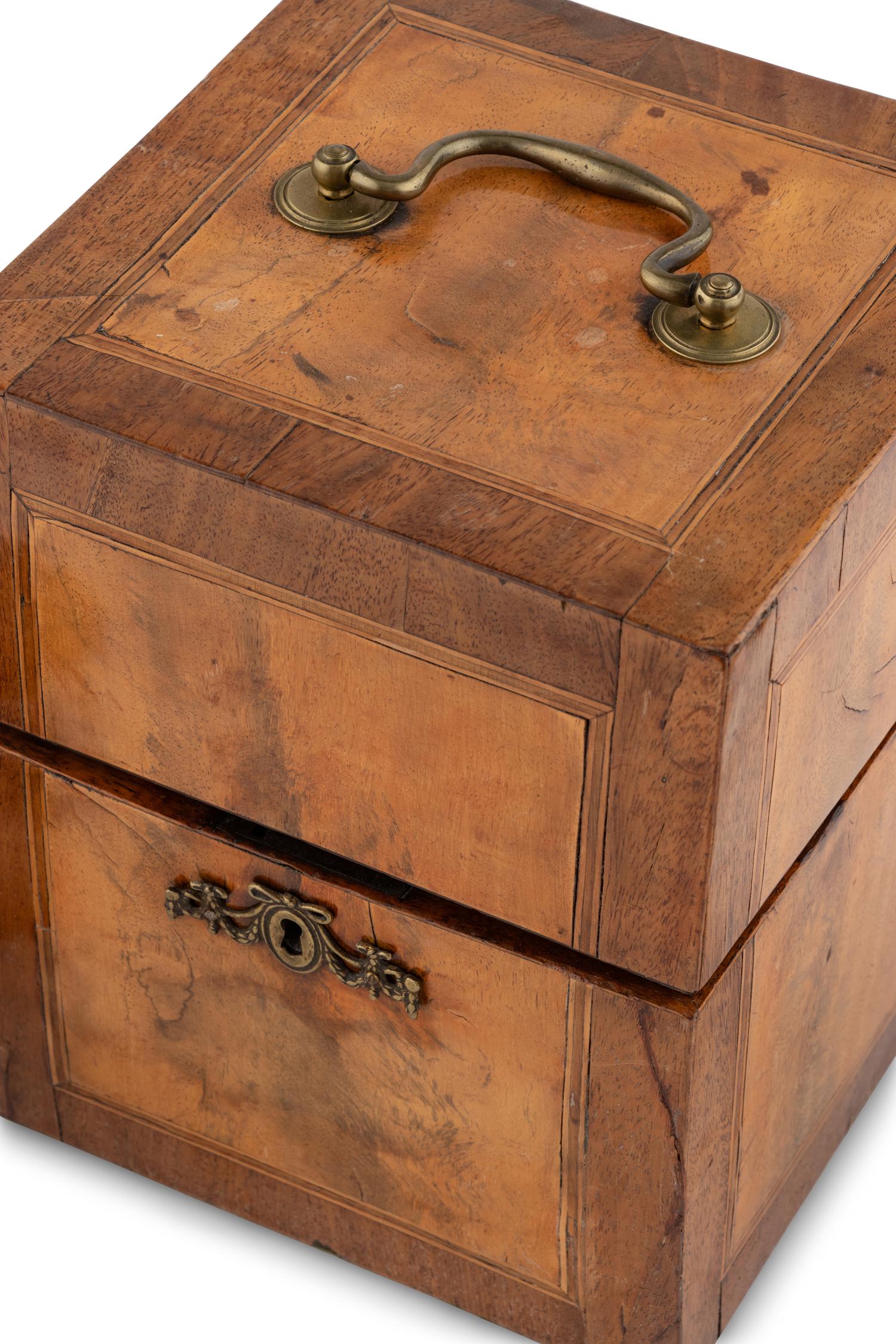 A Walnut and Mahogany Tantalus and Three Silver-Mounted Horn Tumblers