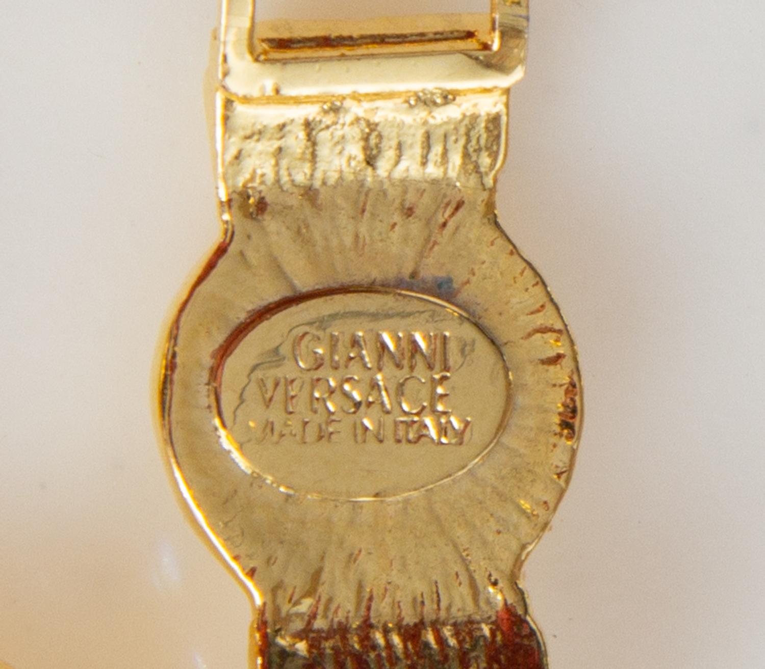 A Gianni Versace Medusa Medallion Link Bracelet, 7" X .5".