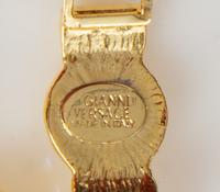 A Gianni Versace Medusa Medallion Link Bracelet, 7" X .5".