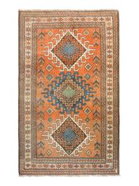 An Anatolian Wool Rug — 20TH CENTURY
